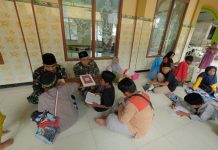 Di Balik Seragam Loreng, Terselip Ketulusan: Satgas TMMD Mengajar Mengaji di Dusun Banyuasin